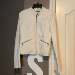 I simply do not wear it.  It’s an eggshell color.